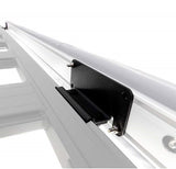 A close-up image of a white rail with a black handle, featuring an ARB BASE Rack Awning Bracket 1780240 by ARB.