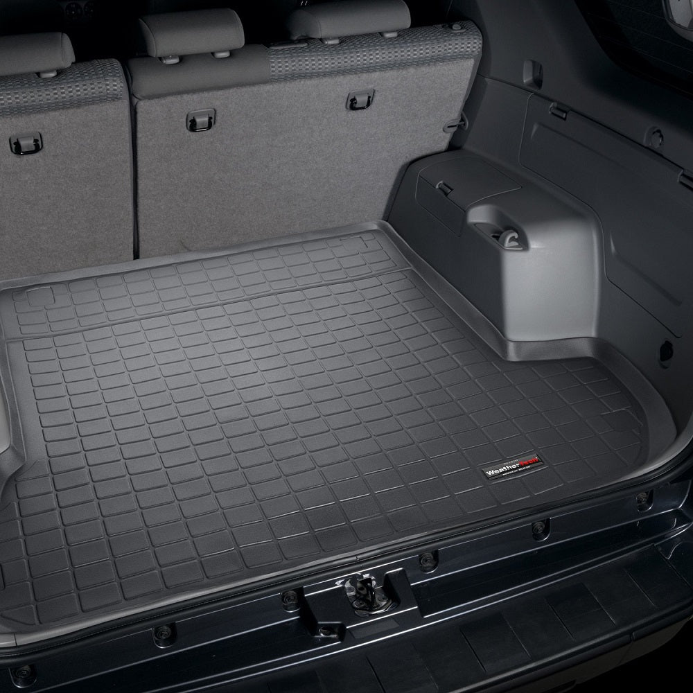 The trunk of a Toyota 4Runner (2003-2009) SUV with a Weathertech Cargo Liner for skid-resistant protection.