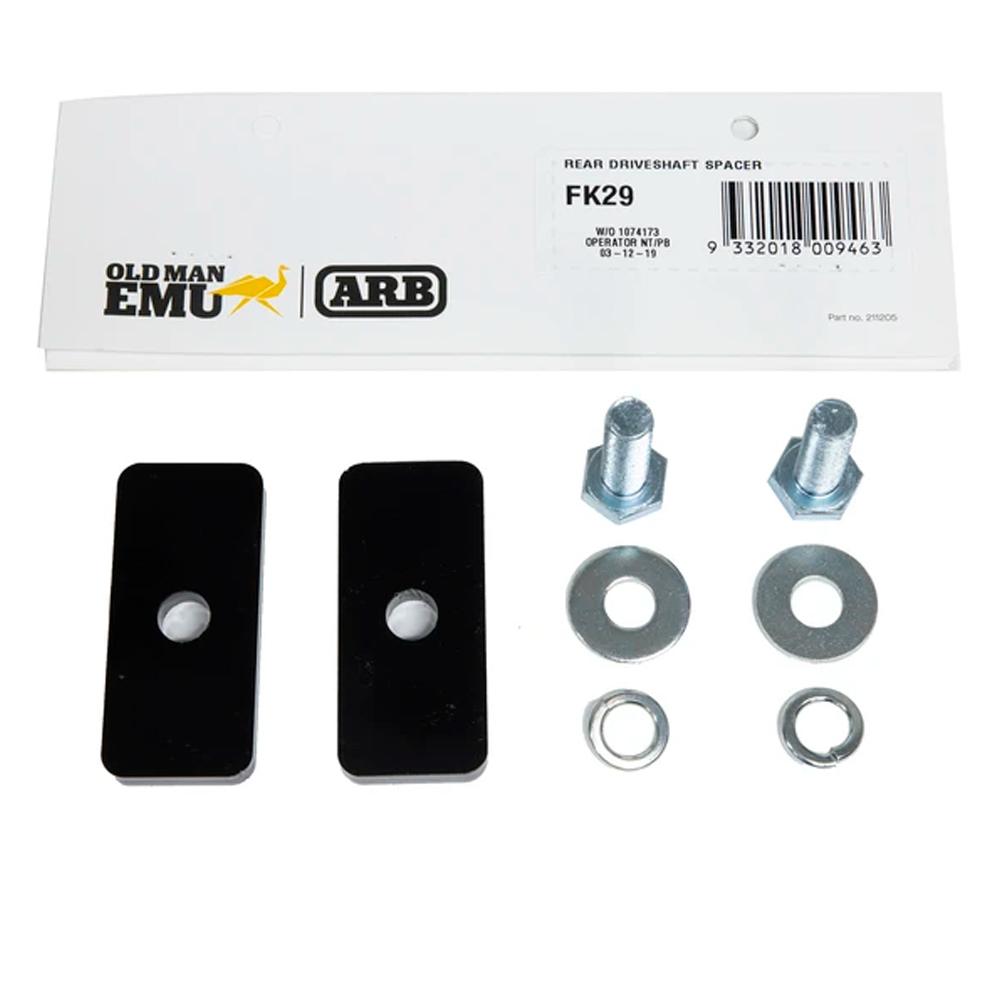 A black package containing a set of bolts, nuts and washers for an Old Man Emu Rear Driveshaft Spacer Kit / Fitting Kit FK29 for Toyota Tacoma V6.