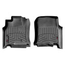A pair of black Weathertech DigitalFit 1st Row Floor Liners for Toyota 4Runner (2003-2009), offering advanced floor protection.