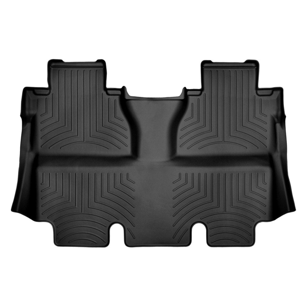 The sleek black Weathertech DigitalFit 2nd Row Floor Liner for Toyota Tundra (2014-2021), made from high-density tri-extruded material.