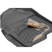 Load image into Gallery viewer, An Weathertech interior protection floor mat designed for a custom fit, featuring a cup of coffee on its black surface.
