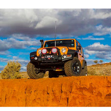 Load image into Gallery viewer, The Old Man Emu Jeep Wrangler offers a smooth ride with its ARB Old Man Emu Front Coil Springs 2615 and adjustable ride height. Plus, it features easy installation for added convenience.
