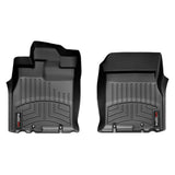 A pair of black Weathertech DigitalFit 1st Row Floor Liners for Toyota FJ Cruiser (2007-2016) for the front and rear of a car, providing excellent floor protection against weather.