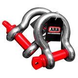A pair of red ARB Recovery Bow Shackles 16mm 3.25T ARB2012 on a white background.