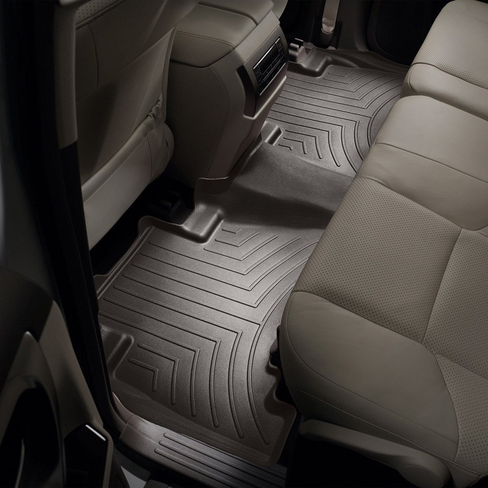The interior of a Toyota 4Runner with Weathertech Floorliner HP 2nd Row Floor Mats perfect for extreme weather environments.