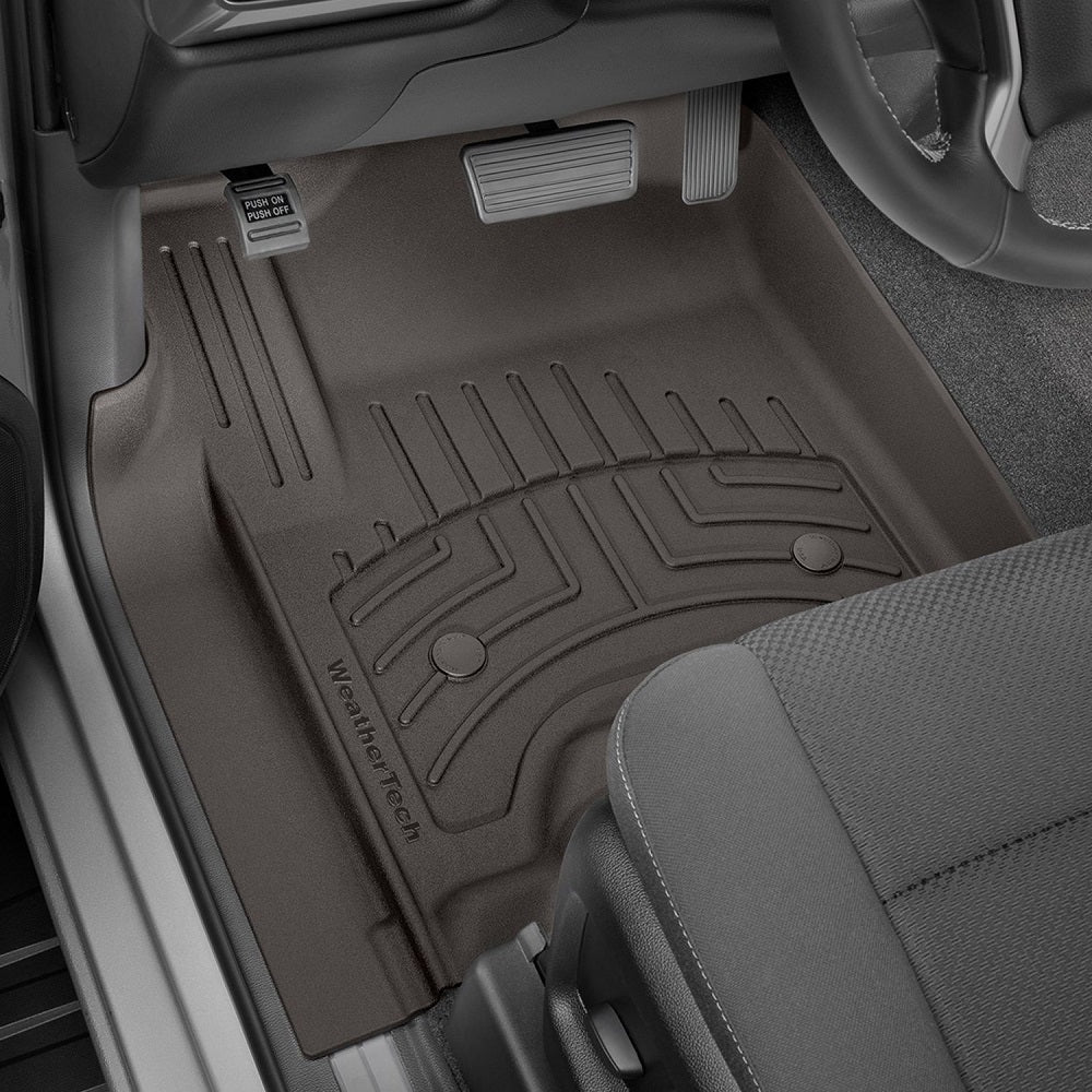 Custom-fit Weathertech Floorliner HP 1st Row Floor Mats for Toyota 4Runner (2013-2023) providing interior protection in brown color.