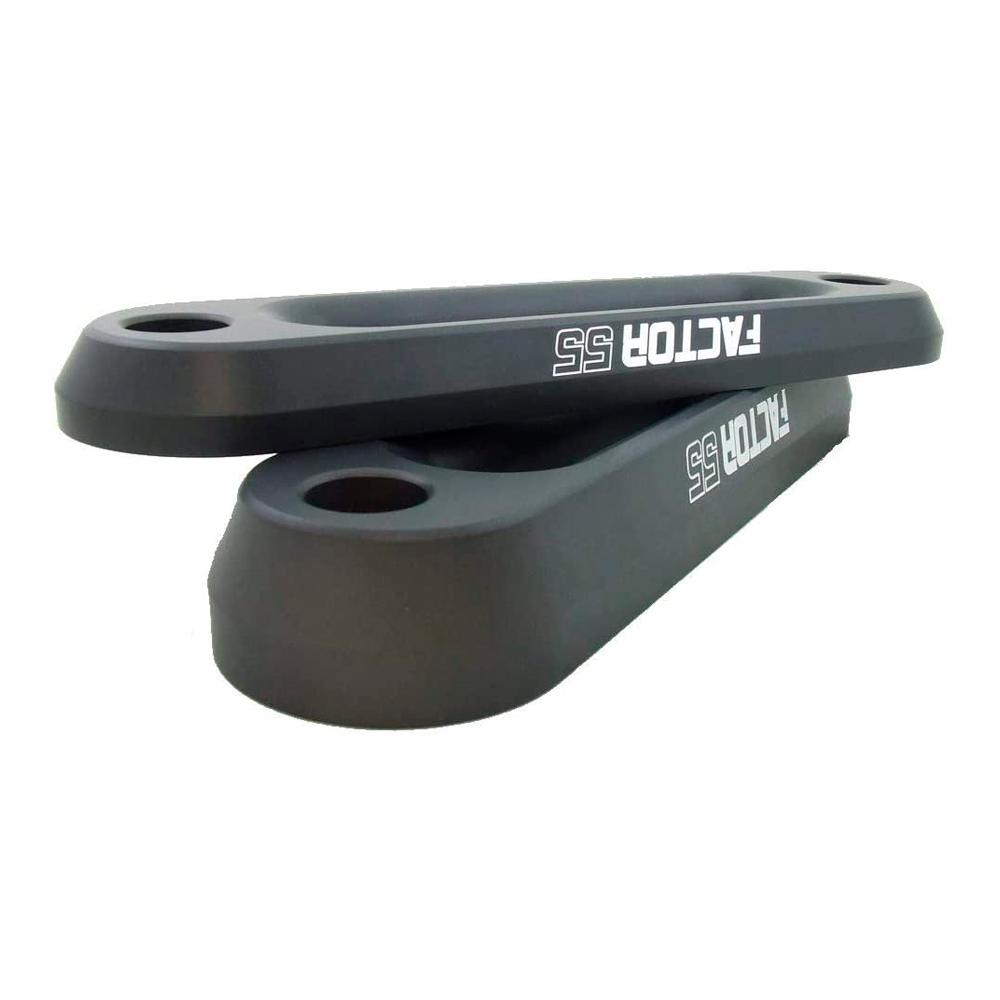 A pair of high quality black rubber bumpers with the word fluid on them, manufactured by Factor 55 XTV Hawse Fairlead 6" 00023.