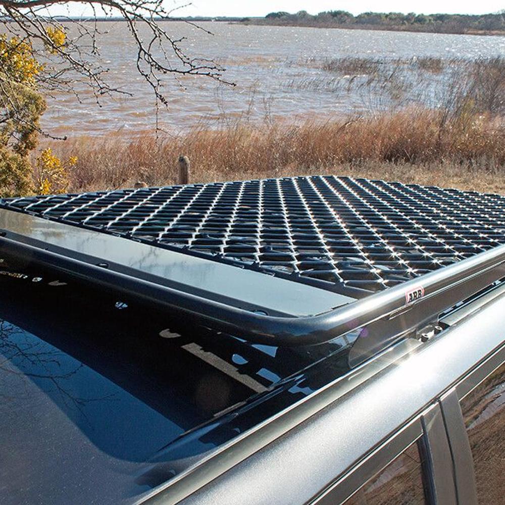 A Toyota 4Runner 2003-2009 with a high capacity Steel Flat Rack 70" X 44" made of high quality materials by ARB.