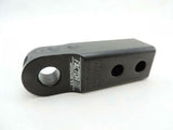 A powder coated black Factor 55 HitchLink 2.0in 00020-04 with holes on it, designed specifically for an aluminum hitchlink with a 9500 lb capacity.