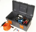A lightweight case with the ARB Portable Air Compressor High Output Kit CKMP12 and hoses in it.