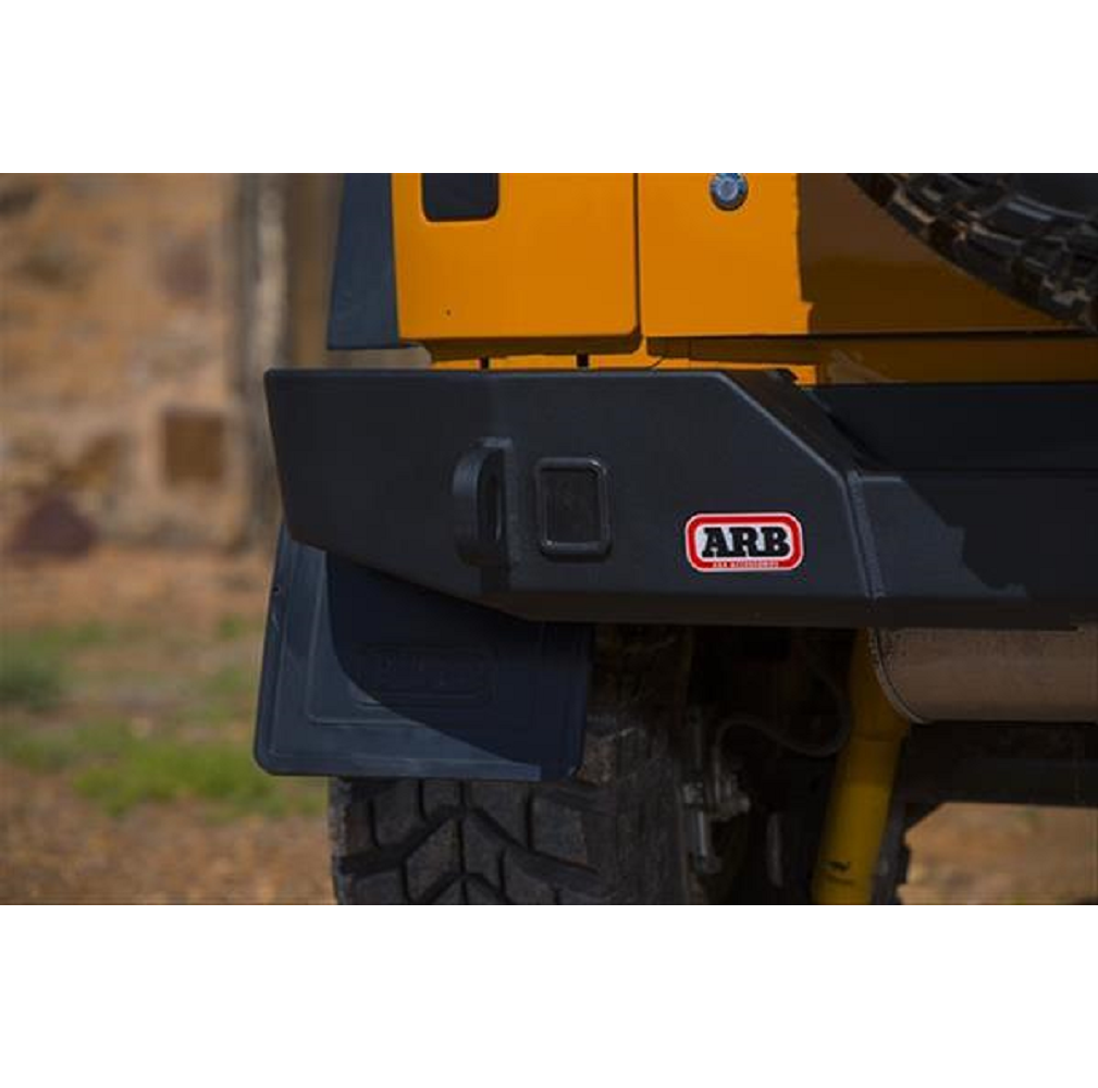 The yellow jeep is equipped with a heavy-duty towing system and a vehicle-specific design that includes an ARB Rear Bumper For Jeep Wrangler JK ARB 5650370.