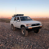 An ARB Old Man Emu Leaf Spring U-Bolt OMEU53B for Toyota 4Runner / Hilux / Tundra / Tacoma is parked in the desert.