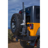 The back of a Jeep Wrangler JK with a tire mounted on an ARB Rear Tire Carrier For Jeep Wrangler JK ARB 5750320.