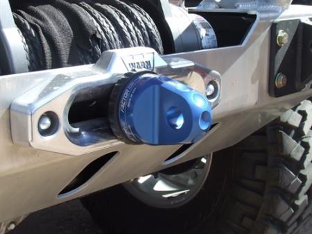 The rear bumper of a jeep with a Factor 55 Shackle Mount in Blue 00015-02 featuring screw pin shackles for enhanced recovery capability.