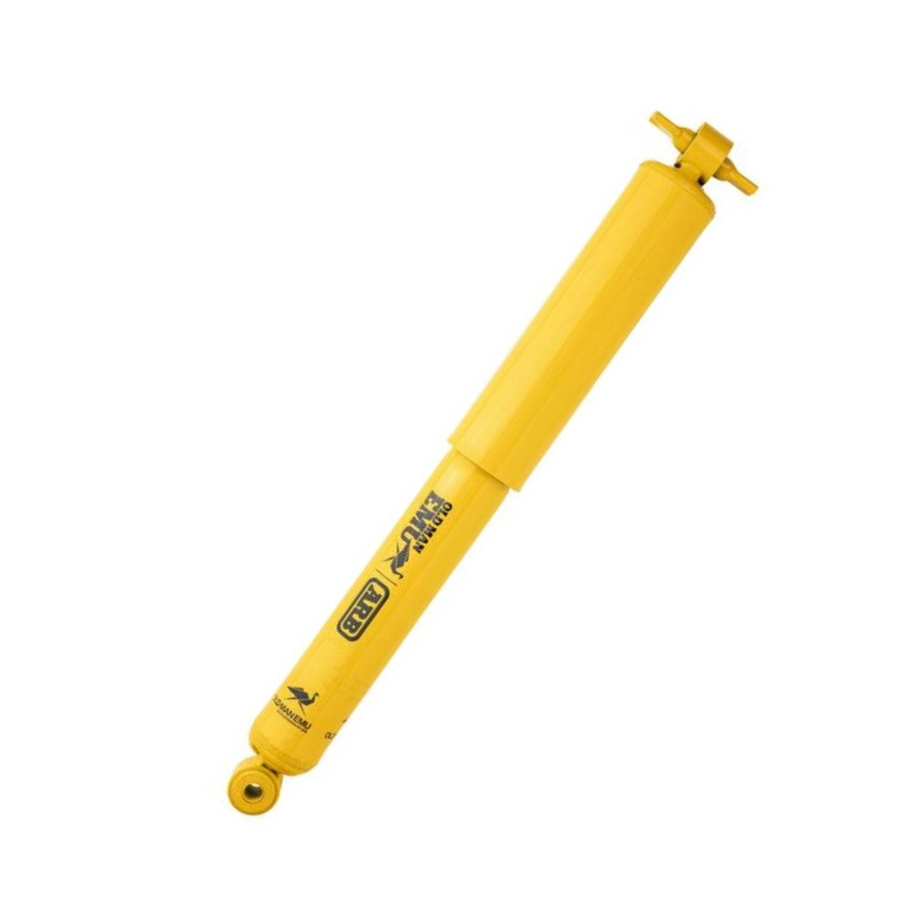 An Old Man Emu Rear Nitrocharger Sport Shock 60048 for Jeep Wrangler TJ 97-06, featuring multi-disc compression valving and high-quality oil, on a white background.