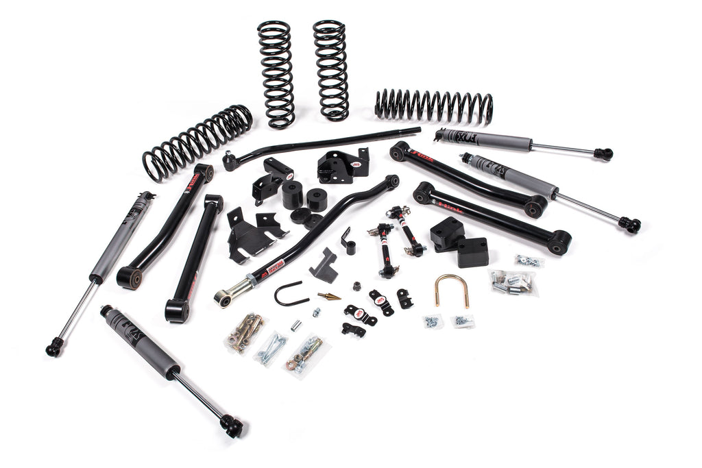 A JKS suspension kit for a Jeep Wrangler JK (06-18) 4 Door with enhanced offroad articulation and improved steering angles.