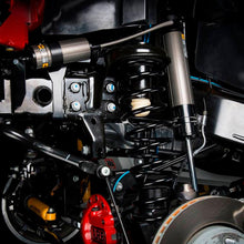 Load image into Gallery viewer, A close up of the Old Man Emu motorcycle suspension system featuring the Old Man Emu shock absorber body and high-temperature hose.