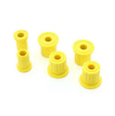 A set of yellow Old Man Emu Spring Bushing Kit OMESB30 for Toyota Landcruiser 40 & 42 series, used for suspension on an off-road vehicle, on a white background.