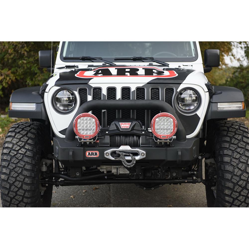 The Old Man Emu front end of a Jeep with adjustable OME control arms and ground clearance.