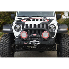 Load image into Gallery viewer, The front end of a Old Man Emu jeep with suspension systems and a black and white logo.