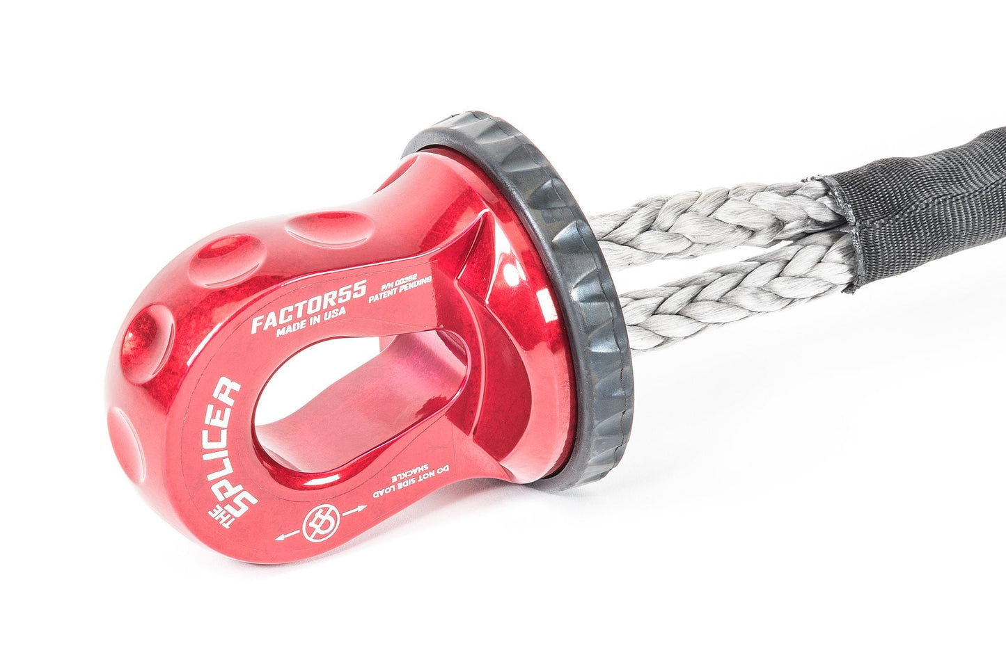 A red synthetic winch rope with a Factor 55 Splicer Shackle Mount Thimble in Red 00352-01 attached to it.