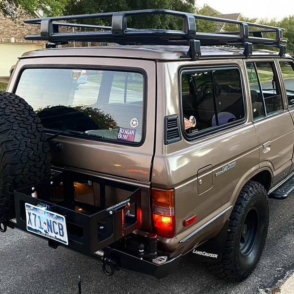 An ARB Roof Rack Fitting Kit 3700060 (43"x44") equipped with a high capacity roof rack for secure storage.