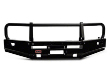 Load image into Gallery viewer, A durable ARB Deluxe Winch Front Bumper 3423030 with steel construction for a jeep wrangler.