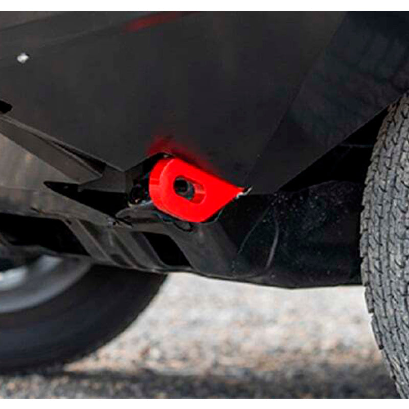 A close up of a black ARB truck with a red steel bumper.