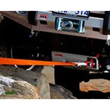 A ARB Recovery Point RH Side 8T ARB Rated 2823010, made of high-grade steel, is securely attached to the back of a jeep.