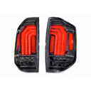 Enhance the performance of your Ford F-150 with these black and red tail lights, designed to perfectly complement the Morimoto XB LED Tails LF705 for Toyota Tundra (2014 - 2021). Upgrade your truck's style and visibility with this Morimoto product.