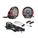 A pair of virtually unbreakable ARB Intensity Solis 21 Flood/Flood Light Kit - SJB21FKIT LED lights, complete with a dust- and waterproof wiring kit, perfect for upgrading your jeep.