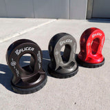 Three Factor 55 Splicer Shackle Mount Thimble in Red 00352-01 bike locks with rope protection on a concrete sidewalk.
