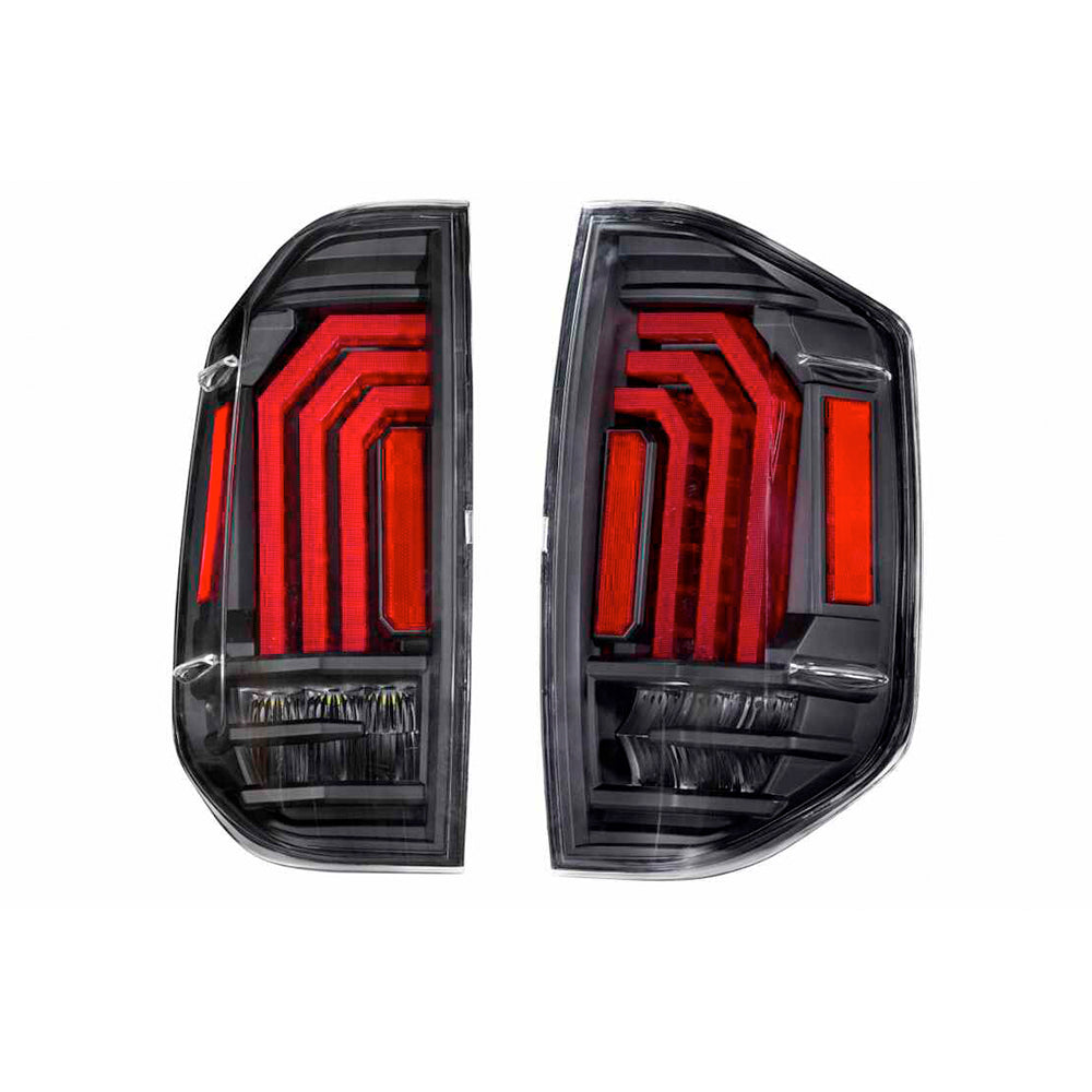 Enhance your Ford F-150 with a vibrant pair of aftermarket Morimoto Xb Led Tails LF705 for Toyota Tundra (2014 - 2021). These high-performance black and red tail lights are the perfect addition to make your truck stand out on.