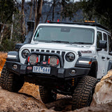 The ARB 4913020MKJL Alloy Flat Roof Rack 70" x 44" with Mesh Floor for Jeep Wrangler JL 2018-2019 is equipped with a secure storage compartment and comes with a fitting kit for easy installation.