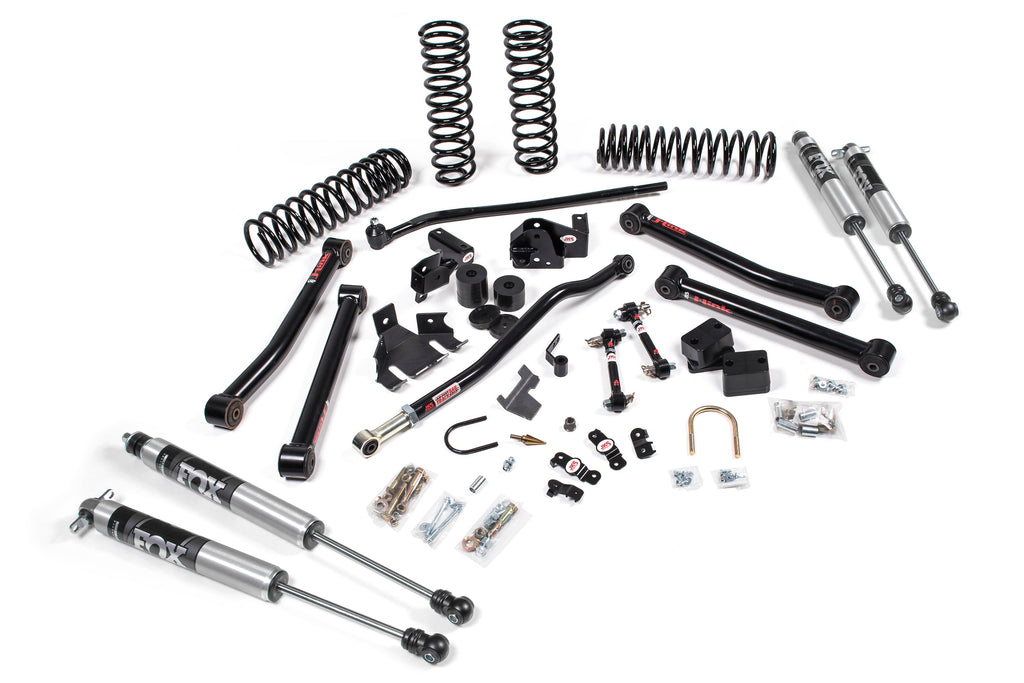 A JKS 3.5 Inch Jeep Wrangler JK (06-18) 4 Door J-Konnect Lift Kit for a jeep with springs and a suspension system.