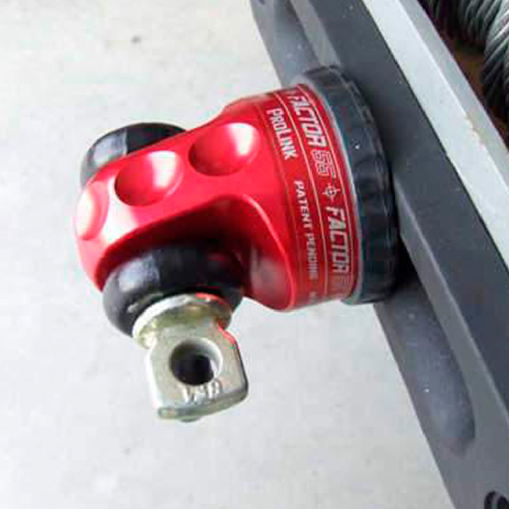 A Factor 55 ProLink XXL Shackle Mount Assembly in Red 00210-01 handlebar mount with a black knob on it made of 6000 series billet aluminum.