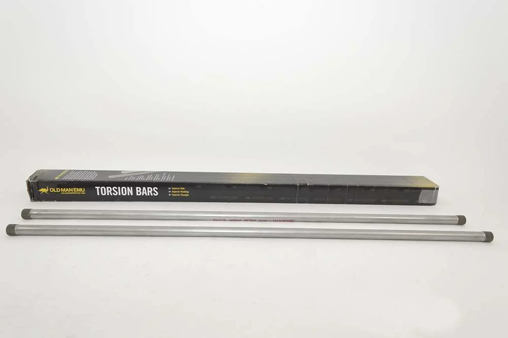 A pair of OME Torsion Bar Set 303002 for Toyota Landcruiser 100 Series Old Man Emu metal rods with suspension performance on a white background.
