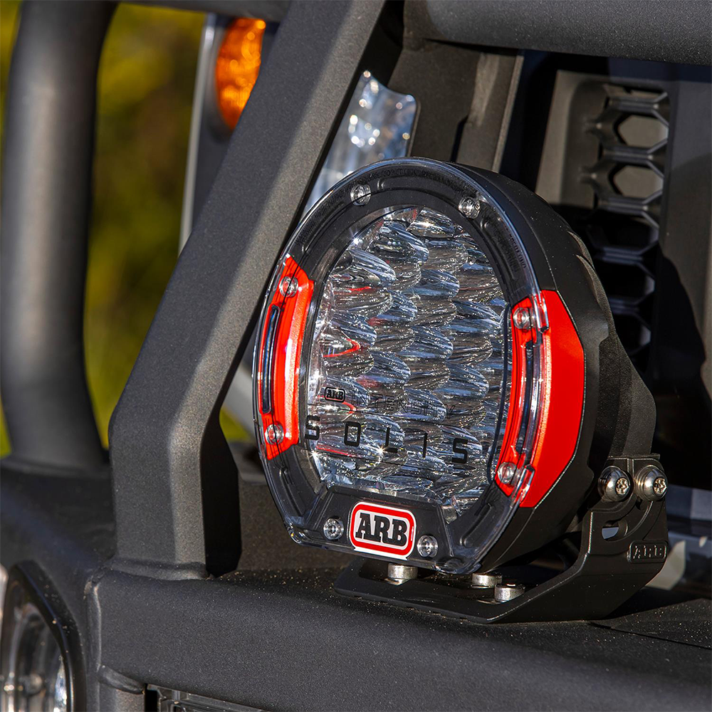 A virtually unbreakable ARB Intensity Solis 21 Flood/Flood Light Kit - SJB21FKIT on a vehicle, featuring a dust- and waterproof design.