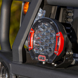 A virtually unbreakable ARB Intensity Solis 21 Flood/Flood Light Kit - SJB21FKIT on a vehicle, featuring a dust- and waterproof design.
