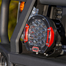 Load image into Gallery viewer, A virtually unbreakable ARB Intensity Solis 21 Flood/Flood Light Kit - SJB21FKIT on a vehicle, featuring a dust- and waterproof design.