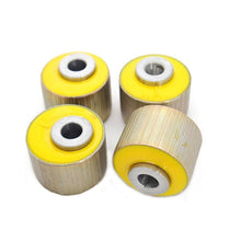 Load image into Gallery viewer, Four yellow Old Man Emu rubber bushings from the 4X4 suspension brand ARB, on a white background.