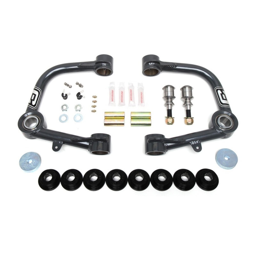 A Camburg 1.25" Uniball Upper Control Arms CAM-310036 front suspension kit for a car, including ball joints and upper arms to enhance wheel travel.