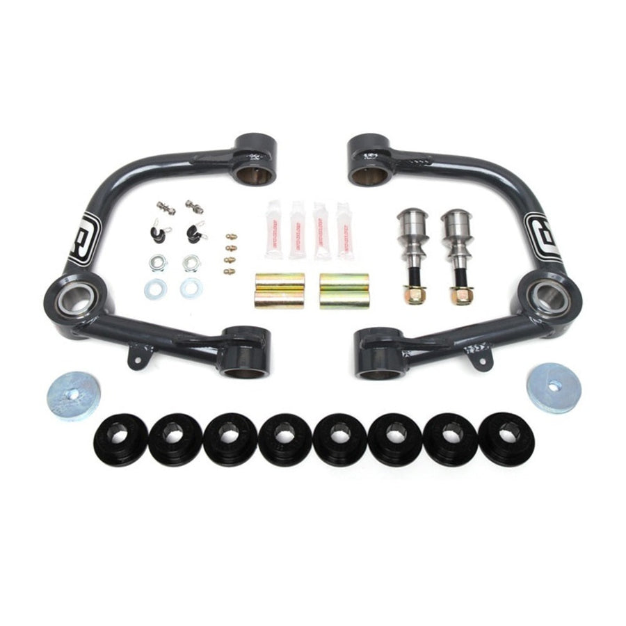 A Camburg 1.25" Uniball Upper Control Arms CAM-310042 for Toyota Landcruiser 200 Series (2007-2021) front suspension kit that includes upper arms and ball joints to enhance wheel travel.