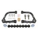 A set of Camburg 1.5" Uniball Upper Control Arms CAM-310041 for Toyota Tundra 2007-2021 (2WD / 4WD) for the front suspension of a car, providing optimal wheel travel.