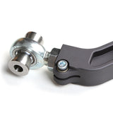 A Camburg Kinetik Billet Uniball Upper Control Arms for Toyota Tacoma, 4Runner handlebar clamp with an adjustable camber and caster bolt on it.