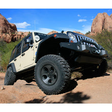 Load image into Gallery viewer, The Fox Racing Jeep Wrangler offers increased ride height and enhanced ride quality for an improved off-road experience. With its increased load-carrying capacity, this reliable vehicle is perfect for any adventure.