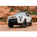 The white King Shocks 4Runner, known for its exceptional off-road performance, can be found parked in the vast desert.