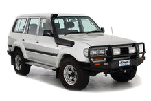 Load image into Gallery viewer, A white suv is parked on a Safari Snorkel Intake Kit Toyota Landcruiser 80 Series (1990-1997) ARB SS82R background.