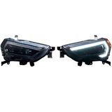 A pair of Morimoto XB LED headlights for Toyota 4Runner (2014-2023), depicted on a white background.